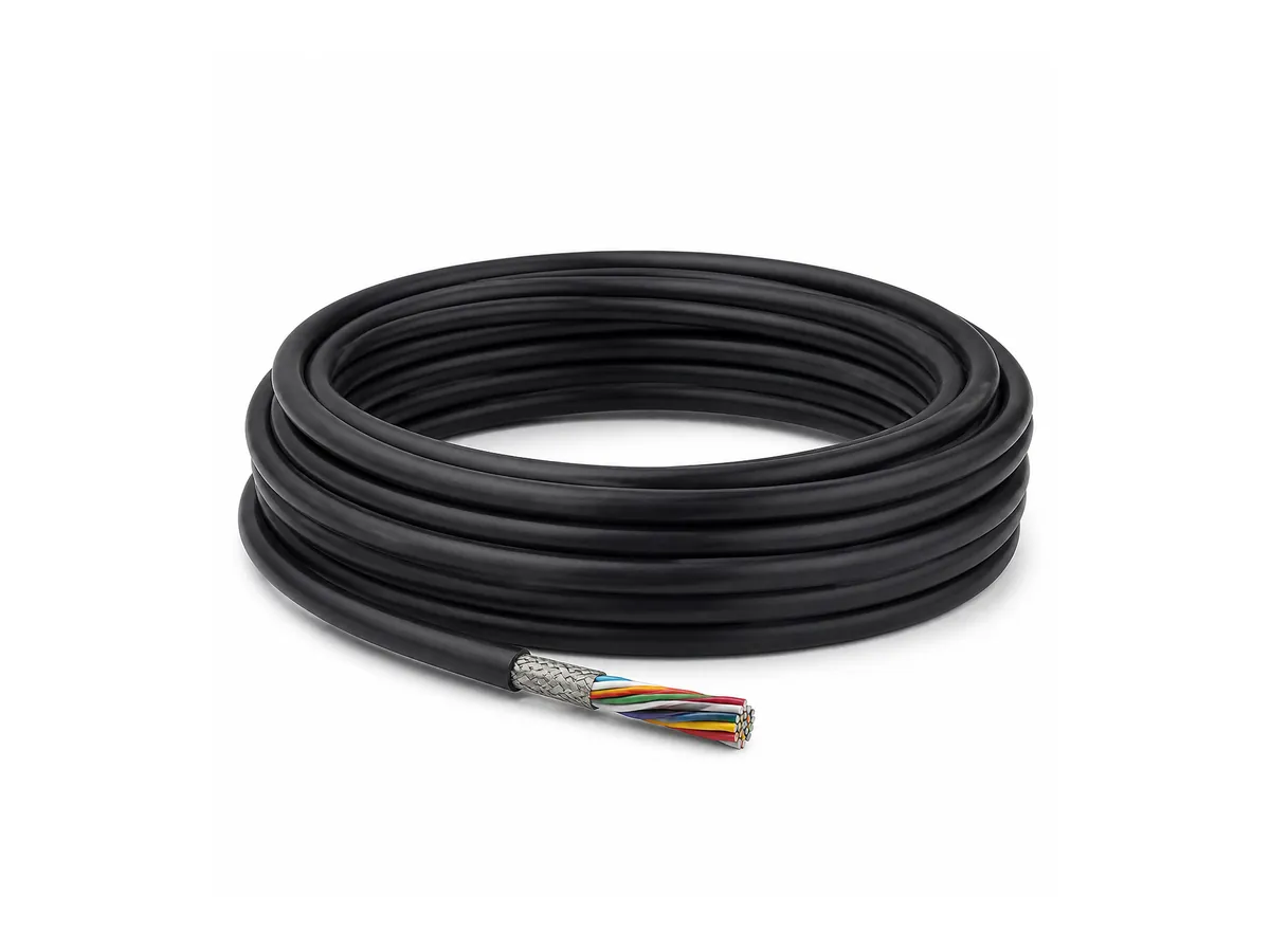 Coiled grating encoder cable on white background